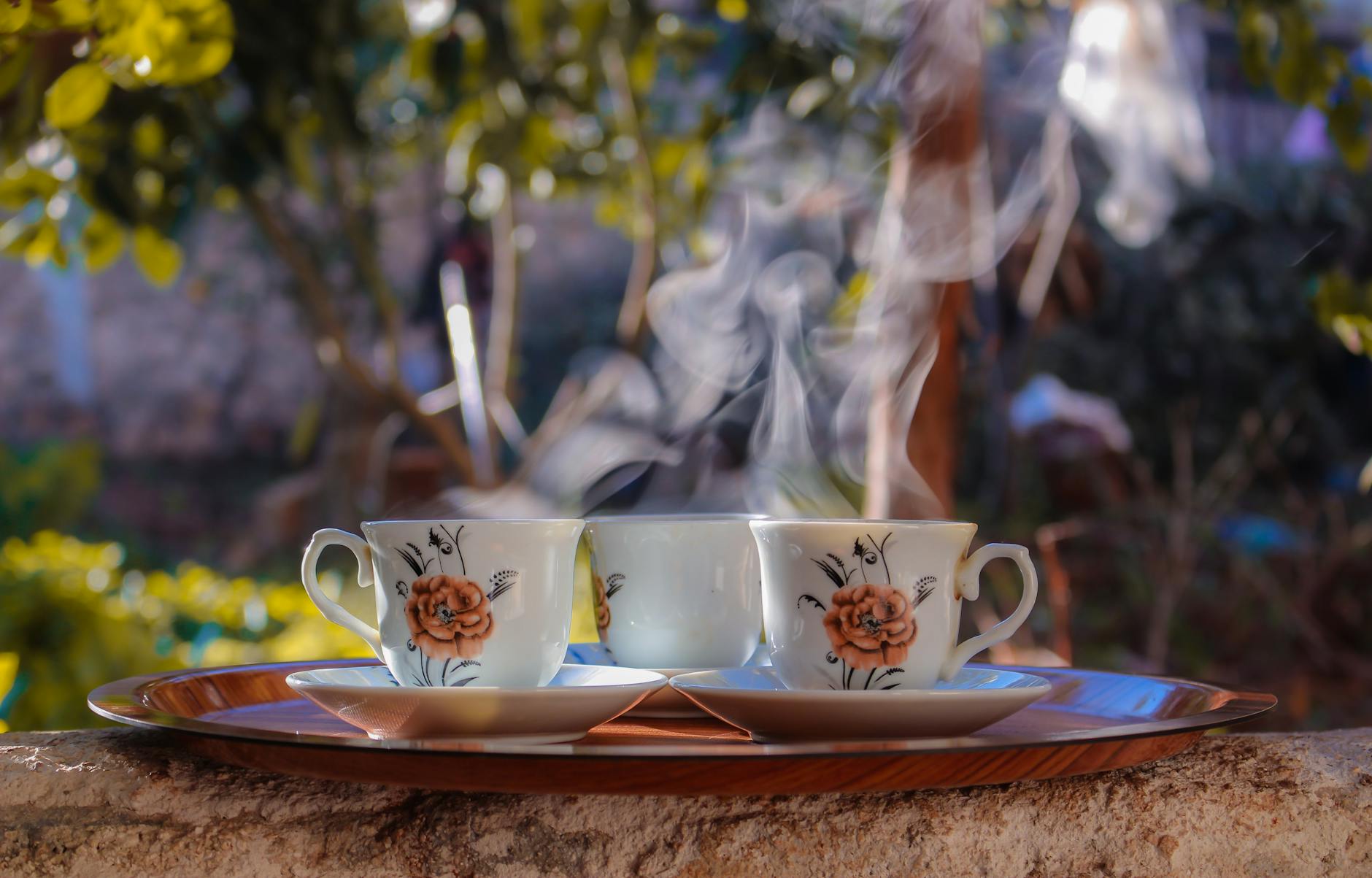 teacups and saucers on a tray