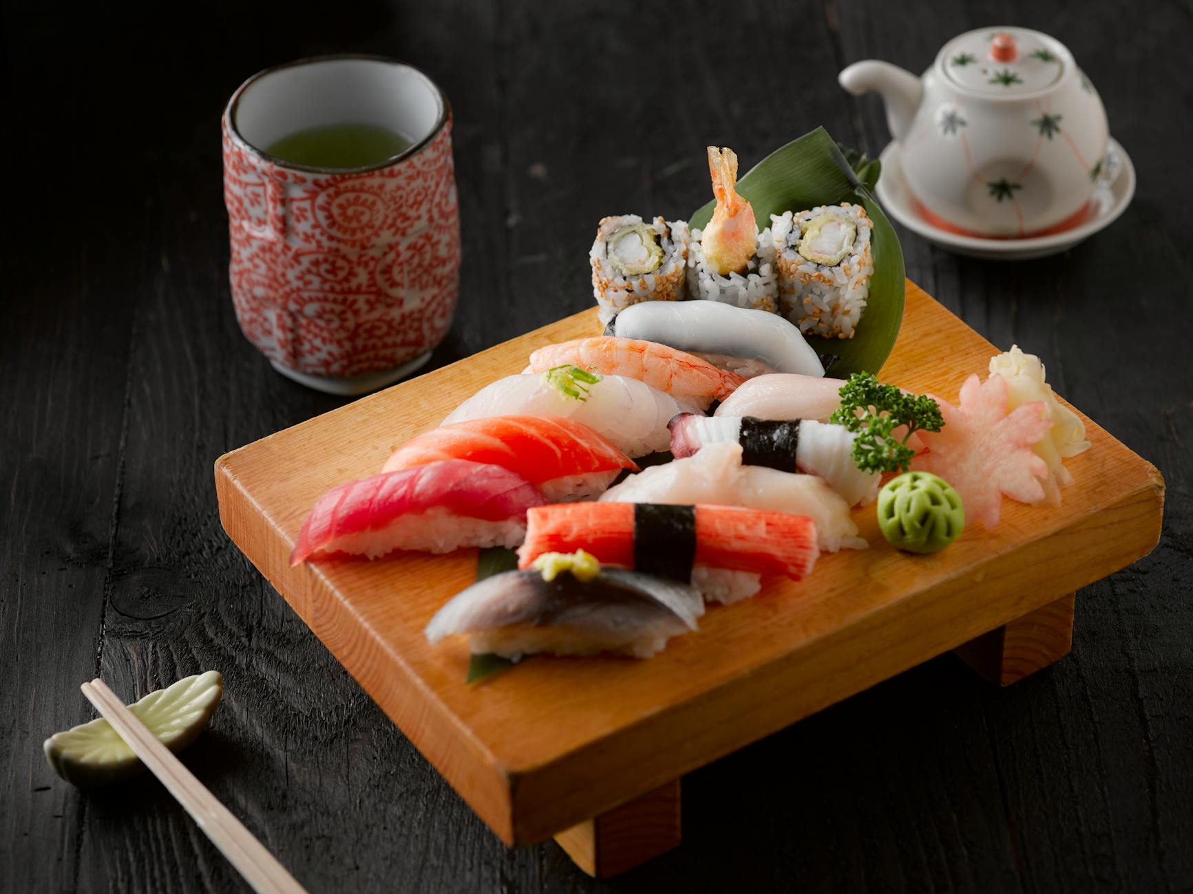 sushi on brown wooden board